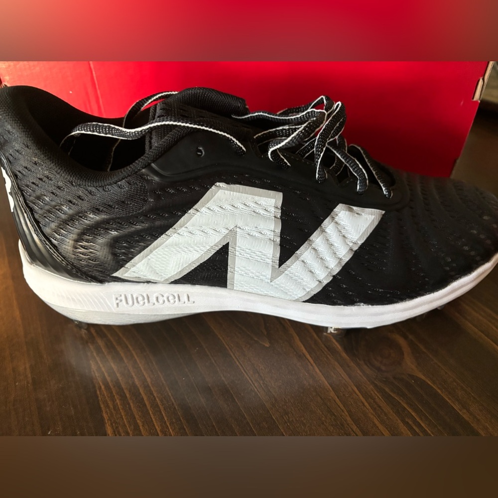 Brand new metal cleats.